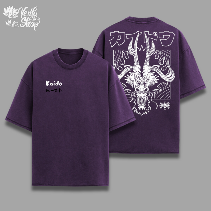 Kaido Oversized Shirt — inspired by One Piece A purple oversized t-shirt with a graphic of a cartoonish character on the front and the name 'Kaido' printed on the back. The shirt is presented in two views, one showing the front and the other showing the back.