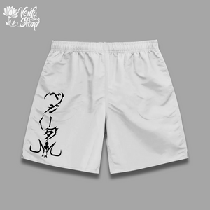 A pair of black gymwear shorts with a white graphic design of a character on the lower right leg.