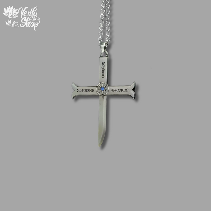 Dracule Mihawk inspired design Silver cross-shaped pendant with engraved text on a gray background