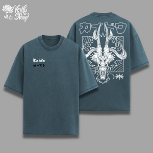  Kaido Oversized Shirt — inspired by One Piece A purple oversized t-shirt with a graphic of a cartoonish character on the front and the name 'Kaido' printed on the back. The shirt is presented in two views, one showing the front and the other showing the back.