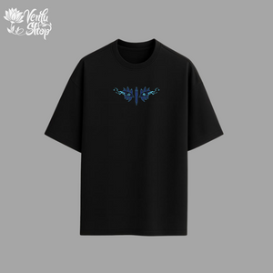 Black t-shirt with blue floral design on a gray background