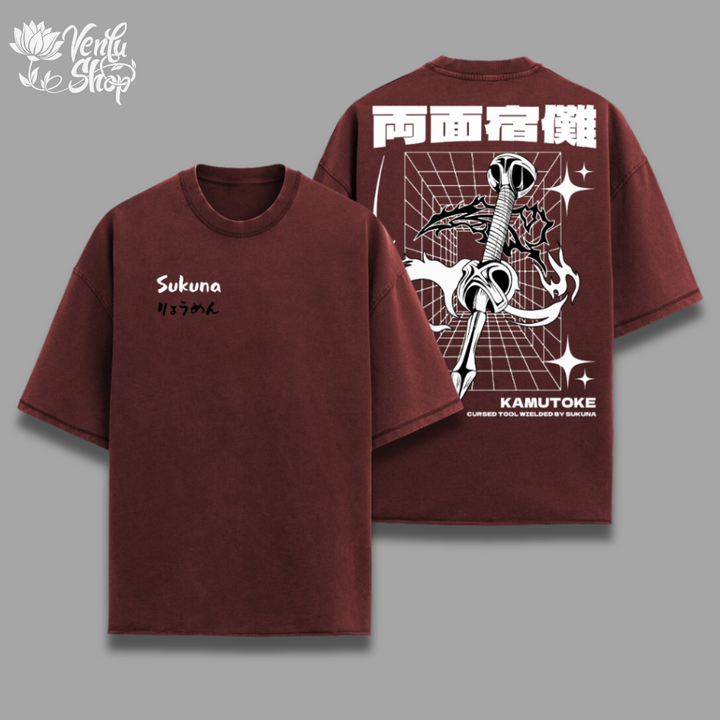  Sukuna Oversized Shirt  A maroon-colored, oversized t-shirt with a graphic print of an anime character on the front and the text 'SUKUNA' on the left chest area. The brand name 'KAMUTOKE' is also visible on the shirt.