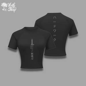 Toji Cropped Compression A black short-sleeved cropped compression shirt with a character design in white on the front and Japanese text on the back.