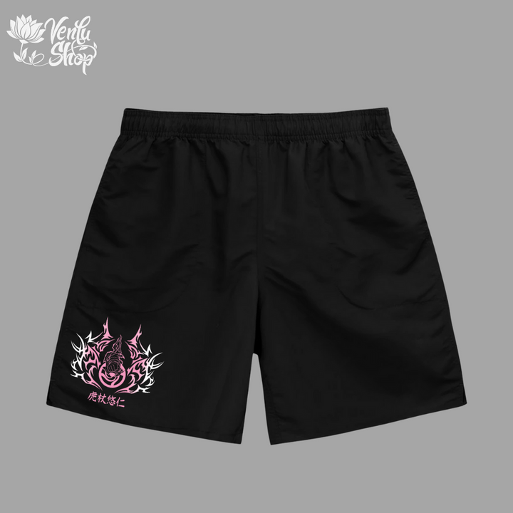 Yuji anime-inspired Black shorts with pink and white design on a gray background