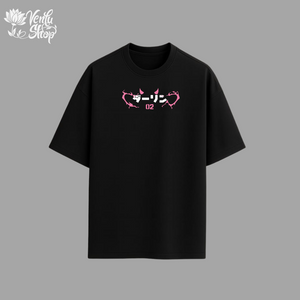 Black t-shirt with pink and white graphic design on a gray background