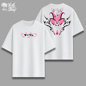 White t-shirt with pink and black designs on a gray background